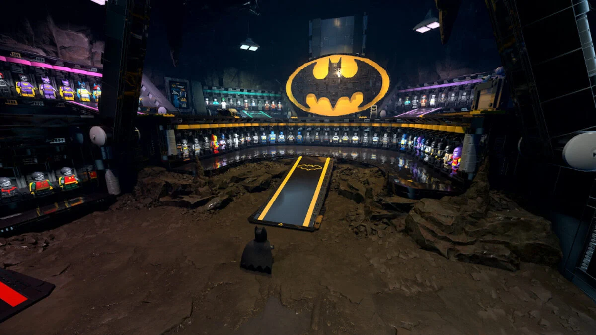 LEGO Batman minifigure looking at a massive wall of Bat-suits in a cave setting