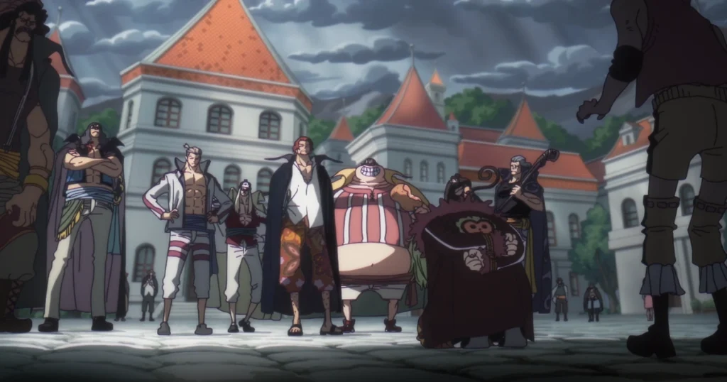 Shanks and the Red Hair Pirates standing in a town square during One Piece Episode 1156.