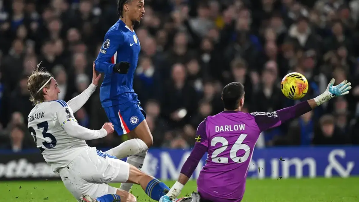 Joao Pedro Chelsea striker in Premier League action – Brazilian forward battles defender and goalkeeper