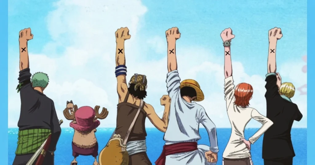 Straw Hat Pirates crew from behind raising fists to the sea - iconic One Piece anime scene. One Piece Remake Will have this too.